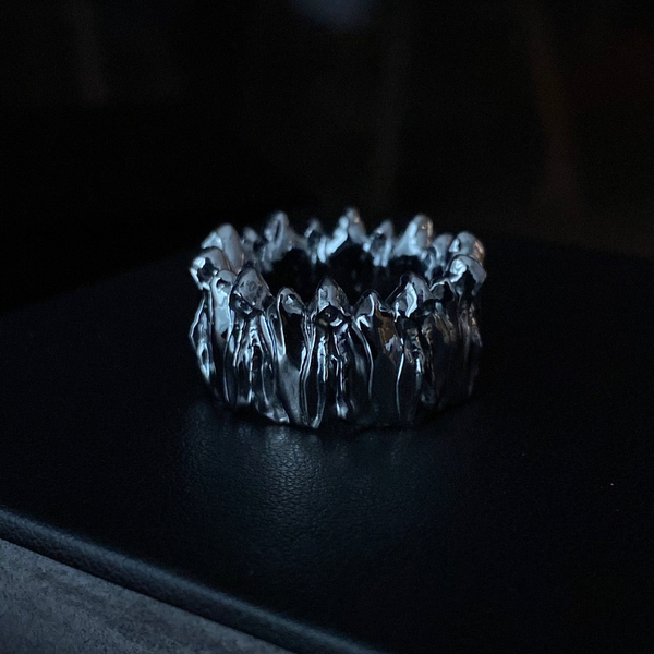Grey Council sculptural ring of black-grunge 18 k gold, band formed by twelve hooded figures, handcrafted by GROMOV