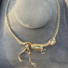 Yellow Solid Gold 18k Tyrannosaur NEX necklace—an articulated T-rex skeleton