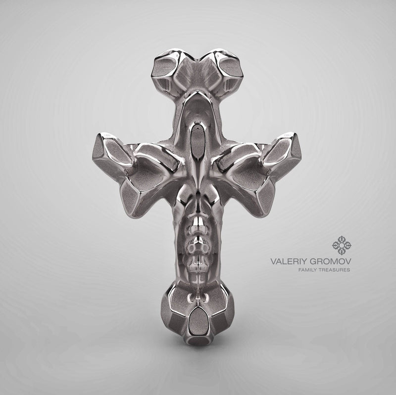 Grey gold cross pendant on a gray background with 'Valeriy Gromov Family Treasures' branding.